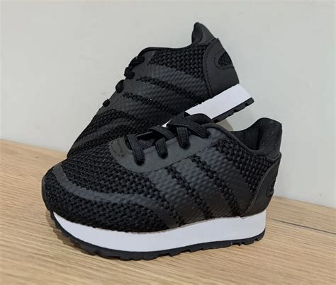 cheap black adidas trainers|Adidas black trainers size 4.